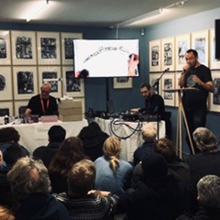 A live drawing-music-text performance